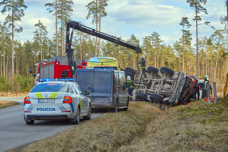 March 31, 2020, Iecava, Latvia: car accident on a road, truck after a collision with a heavy truck, transportation backgroundのeditorial素材