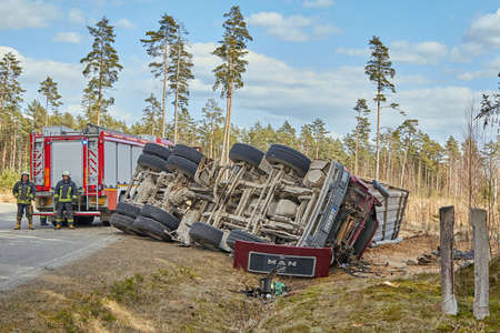 March 31, 2020, Iecava, Latvia: car accident on a road, truck after a collision with a heavy truck, transportation backgroundのeditorial素材