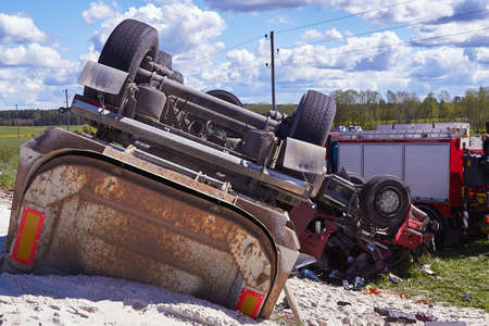 May 15, 2020, Inciems, Latvia: car accident because damaged tire, truck got off the road and rolled over onto the roof, as result truck driver died on a accident placeのeditorial素材