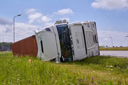 June 12, 2020, Tinuzi, Latvia: car accident because damaged tire, truck got off the road and rolled over onto the roof, as result truck driver died on a accident placeのeditorial素材