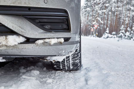 January 18, 2021, Engure Latvia: Car on snowy road in forest in winterの写真素材