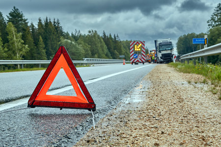 August 19, 2022,Tinuzi, Latvia: car accident on a road, truck after a collision with a road barrier,...