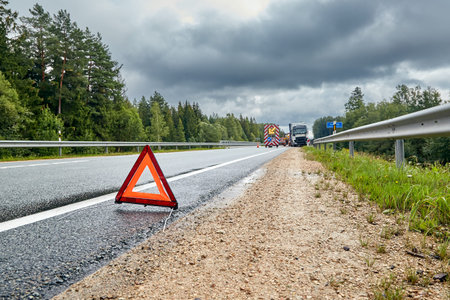 August 19, 2022,Tinuzi, Latvia: car accident on a road, truck after a collision with a road barrier,...