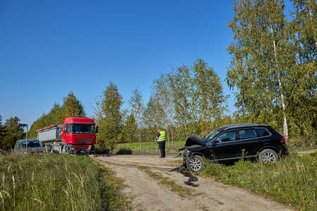 September 30, 2021, Riga, Latvia: car accident on a road, truck after a collision with car, transportation backgroundの写真素材