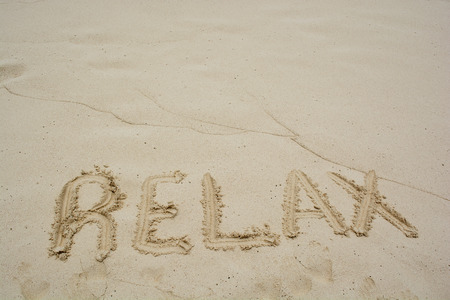 Word Relax on beach - vacation concept background.の写真素材