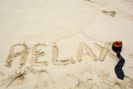 Tie relax on the sea blue.の写真素材