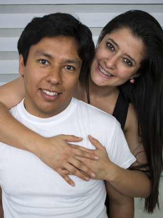 Smiling young couple in sofa at home.

の写真素材