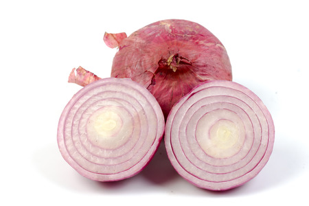 Red sliced onion isolated on white backgroundの写真素材