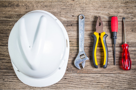 construction concept with hard hat working toolsの写真素材