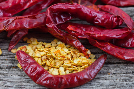Peppers drying on a white background