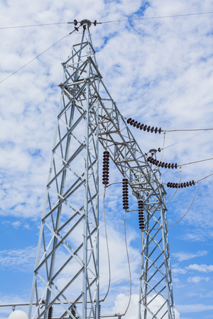 electricity post with clear blue skyの写真素材