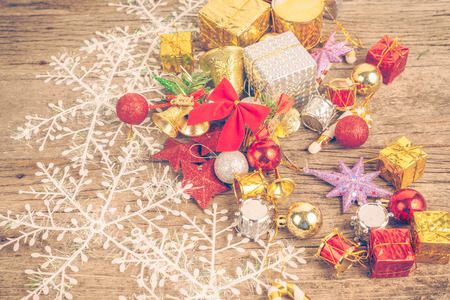 Chrismas baubles and vary of decoration on wood backgroundの写真素材