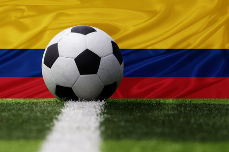 Colombia soccer ball and Colombia flagの写真素材