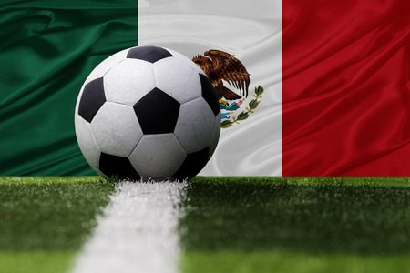 Mexico soccer ball and Mexico flagの写真素材