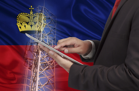 business and mobility communications concept Liechtenstein Flag backgroundの写真素材