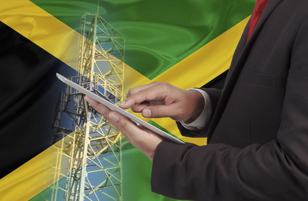 business and mobility communications concept Jamaica Flag backgroundの写真素材