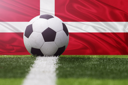 Denmark soccer ball against Denmark flagの写真素材