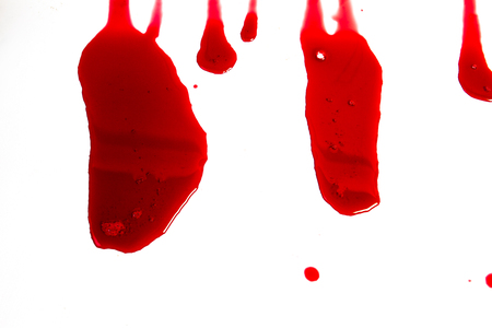 Dripping blood isolated on whiteの写真素材