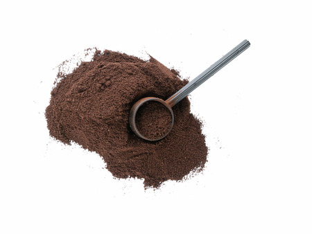 Isolated top view of coffee grounds with scoopの写真素材