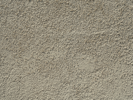 beige stucco textured wall backgroundの写真素材