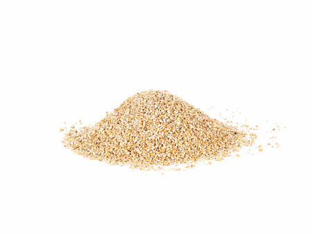 Side view of solated pile of raw steel cut oatsの写真素材