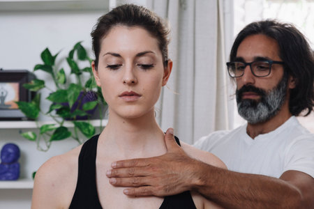 close-up of a beautiful woman being laid by a kinesiologist