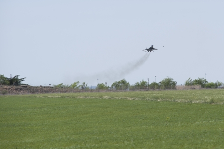 ALBACETE,SPAIN - APRIL 11: Military fighter jet during demonstration in Albacete air base, Los Llanos (TLP) on April 11, 2012 in Albacete,Spainのeditorial素材