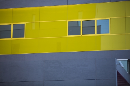 Modern office buildings  Colorful buildings in a industrial place  Yellow windows のeditorial素材