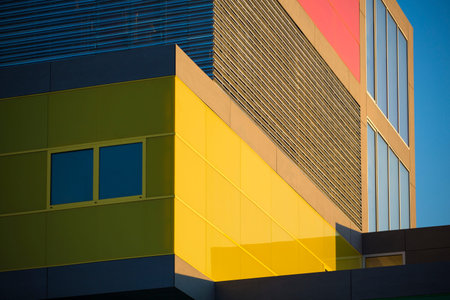 Modern office buildings whit red and yellow windows  Colorful buildings in a industrial place whit...