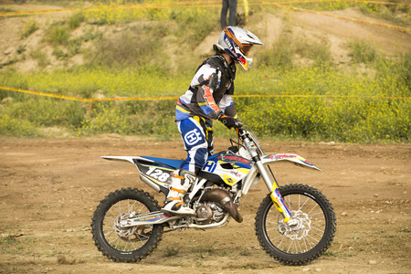 GRANADA, SPAIN - APRIL 20 : Unknown racer on the competition " Motocross Championship to Granada" on April 20, 2014 in Granada, Spainのeditorial素材