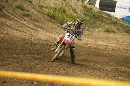GRANADA, SPAIN - APRIL 20 : Unknown racer on the competition " Motocross Championship to Granada" on April 20, 2014 in Granada, Spainのeditorial素材