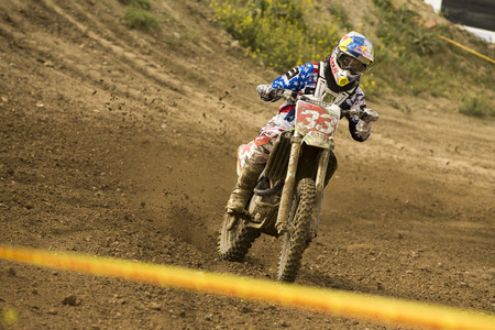 GRANADA, SPAIN - APRIL 20 : Unknown racer on the competition " Motocross Championship to Granada" on April 20, 2014 in Granada, Spainのeditorial素材