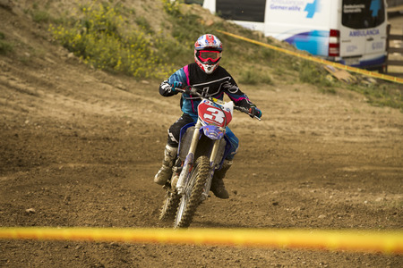 GRANADA, SPAIN - APRIL 20 : Unknown racer on the competition " Motocross Championship to Granada" on April 20, 2014 in Granada, Spainのeditorial素材