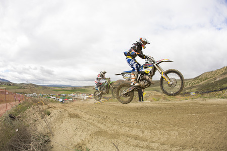 GRANADA, SPAIN - APRIL 20 : Unknown racer on the competition " Motocross Championship to Granada" on April 20, 2014 in Granada, Spainのeditorial素材