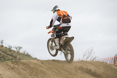 GRANADA, SPAIN - APRIL 20 : Unknown racer on the competition " Motocross Championship to Granada" on April 20, 2014 in Granada, Spainのeditorial素材