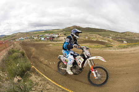 GRANADA, SPAIN - APRIL 20 : Unknown racer on the competition " Motocross Championship to Granada" on April 20, 2014 in Granada, Spainのeditorial素材