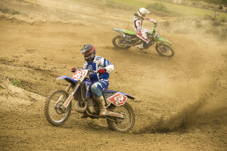 GRANADA, SPAIN - APRIL 20 : Unknown racer on the competition " Motocross Championship to Granada" on April 20, 2014 in Granada, Spainのeditorial素材