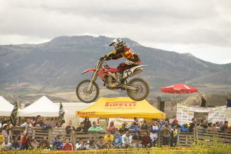 GRANADA, SPAIN - APRIL 20 : Unknown racer on the competition " Motocross Championship to Granada" on April 20, 2014 in Granada, Spainのeditorial素材