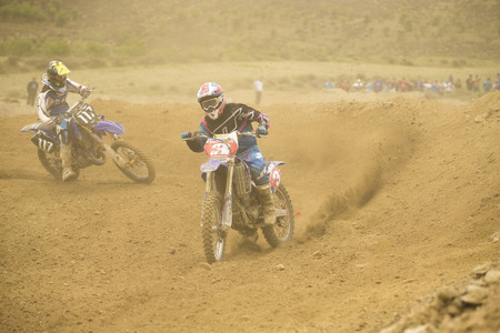 GRANADA, SPAIN - APRIL 20 : Unknown racer on the competition " Motocross Championship to Granada" on April 20, 2014 in Granada, Spainのeditorial素材