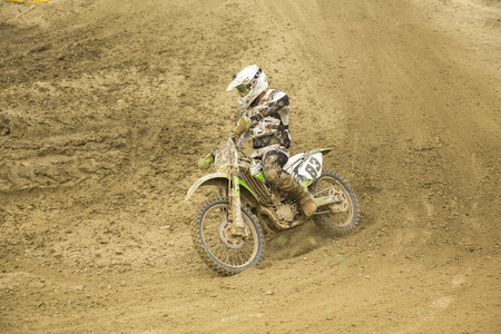 GRANADA, SPAIN - APRIL 20 : Unknown racer on the competition " Motocross Championship to Granada" on April 20, 2014 in Granada, Spainのeditorial素材