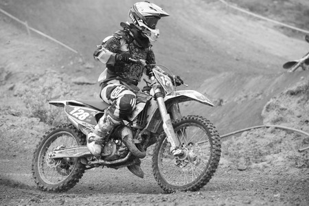 GRANADA, SPAIN - APRIL 20 : Unknown racer on the competition " Motocross Championship to Granada" on April 20, 2014 in Granada, Spainのeditorial素材