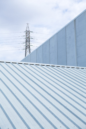 Four ventilation pipes over blue sky closeupの写真素材