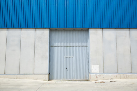 Shutter door, outside of factory.の写真素材