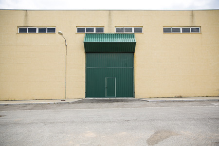 Shutter door, outside of factory.の写真素材