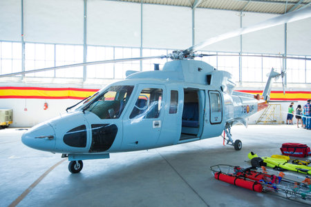 GRANADA,SPAIN - May 18: Aerobatic Spanish helicopter patrol (ASPA Patrol) perform at airshow (10Âº Aanniversary of Aspa Patrol in Granada) on May 18, 2014 in Granada ,Spainのeditorial素材