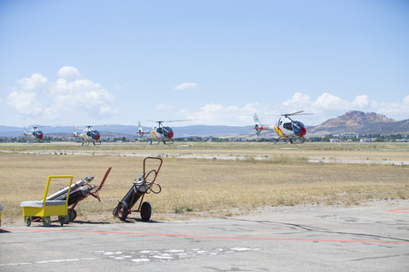 GRANADA,SPAIN - May 18: Aerobatic Spanish helicopter patrol (ASPA Patrol) perform at airshow (10Âº Aanniversary of Aspa Patrol in Granada) on May 18, 2014 in Granada ,Spainのeditorial素材