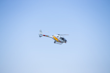 GRANADA,SPAIN - May 18: Aerobatic Spanish helicopter patrol (ASPA Patrol) perform at airshow (10Âº Aanniversary of Aspa Patrol in Granada) on May 18, 2014 in Granada ,Spainのeditorial素材