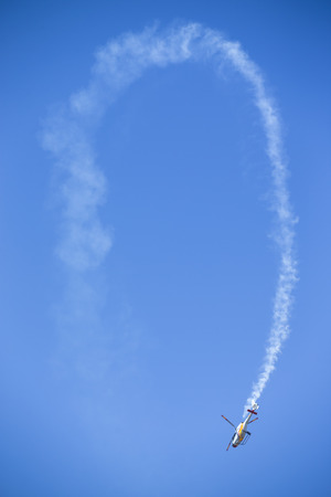 GRANADA,SPAIN - May 18: Aerobatic Spanish helicopter patrol (ASPA Patrol) perform at airshow (10Âº Aanniversary of Aspa Patrol in Granada) on May 18, 2014 in Granada ,Spainのeditorial素材