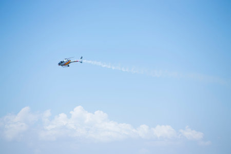 GRANADA,SPAIN - May 18: Aerobatic Spanish helicopter patrol (ASPA Patrol) perform at airshow (10Âº...