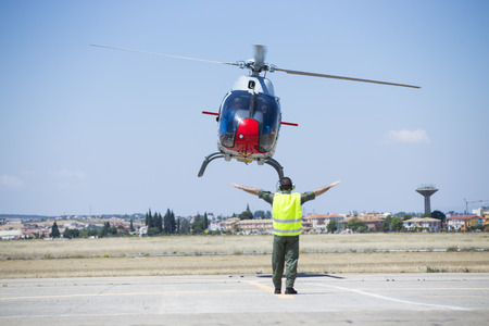 GRANADA,SPAIN - May 18: Aerobatic Spanish helicopter patrol (ASPA Patrol) perform at airshow (10Âº Aanniversary of Aspa Patrol in Granada) on May 18, 2014 in Granada ,Spainのeditorial素材